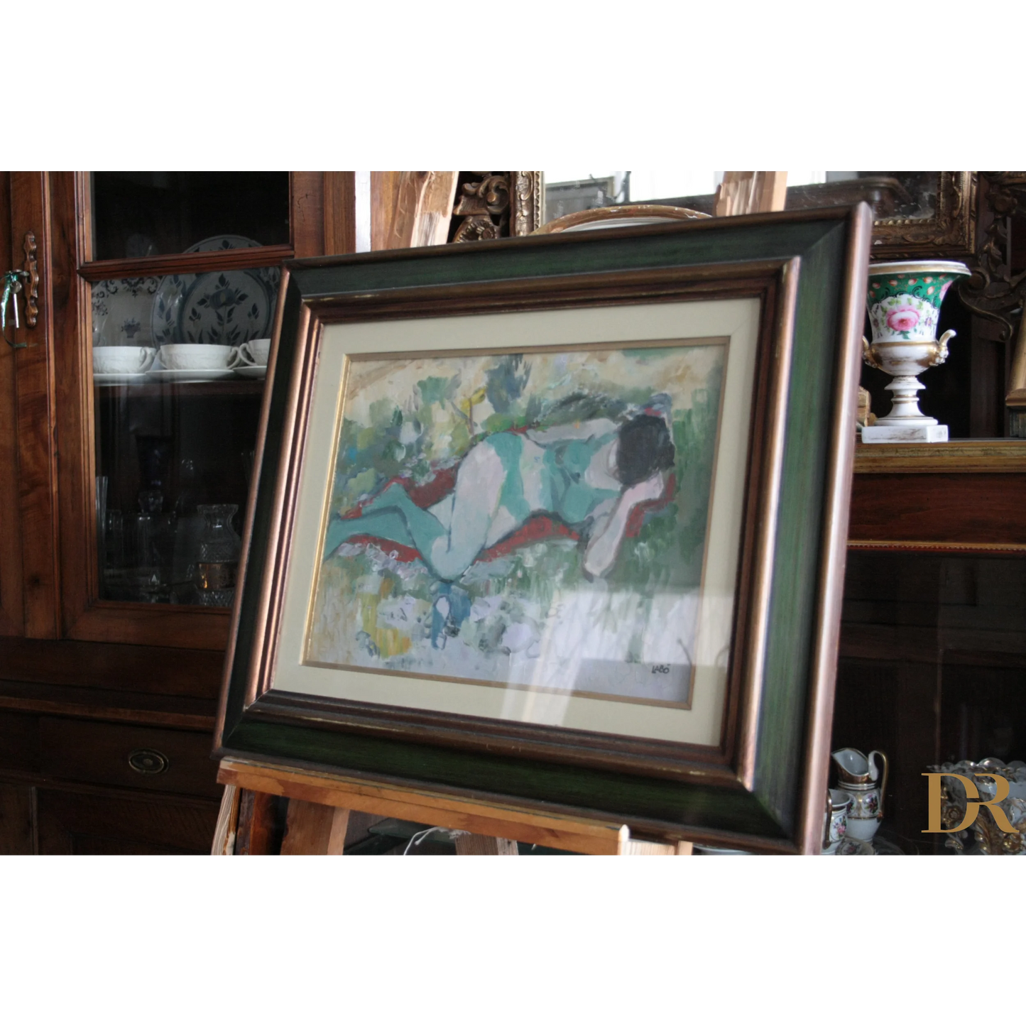 Foto di un dipinto olio raffigurante ragazza distesa su tela firmata Savino Labò