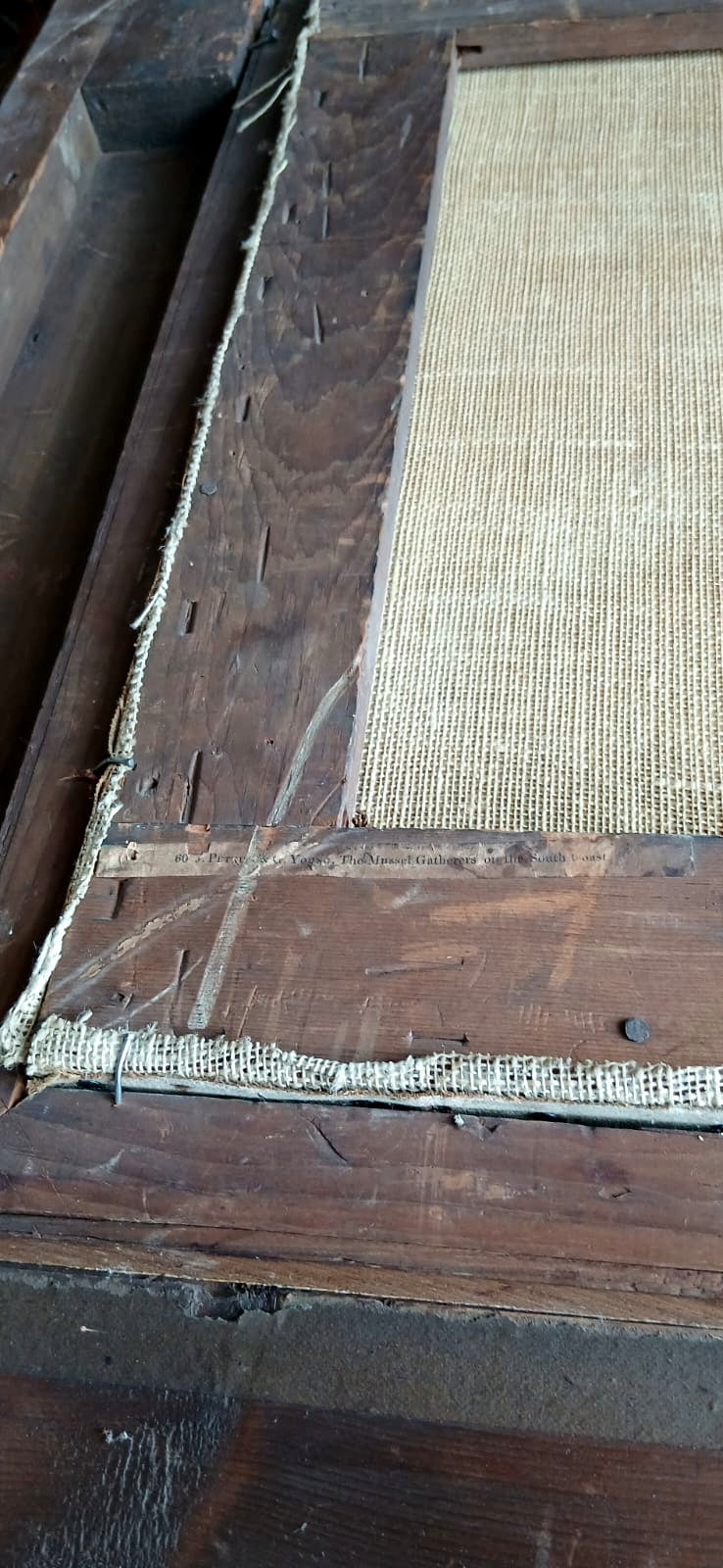 Fotografia di un quadro di Joseph Paul Pettitt con cornice in legno e tessuto intrecciato