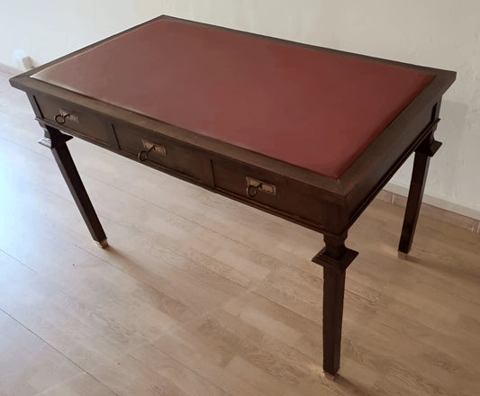 Empire style walnut desk with red leather top and two drawers with 19th century brass details