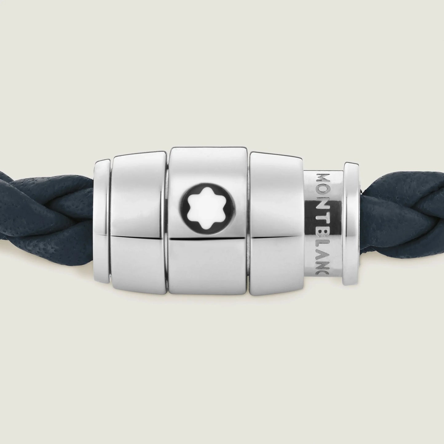 Chiusura magnetica in acciaio pregiato lucido impreziosita con stella montblanc su pelle blu avio intrecciata