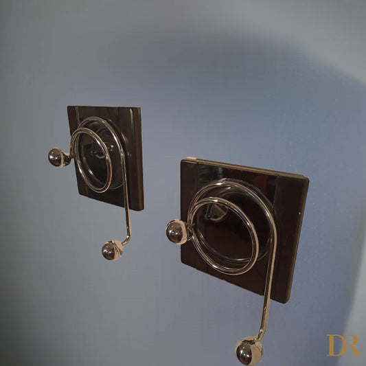 Eleganti ganci appendiabiti Willy Rizzo per Mario Sabot, design anni ’70