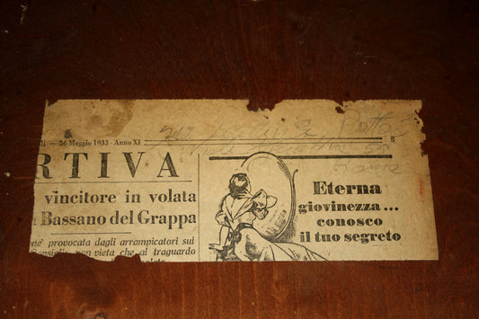 Faded vintage newspaper clipping on credenza due corpi Art Decò, ministro Bottai 1933