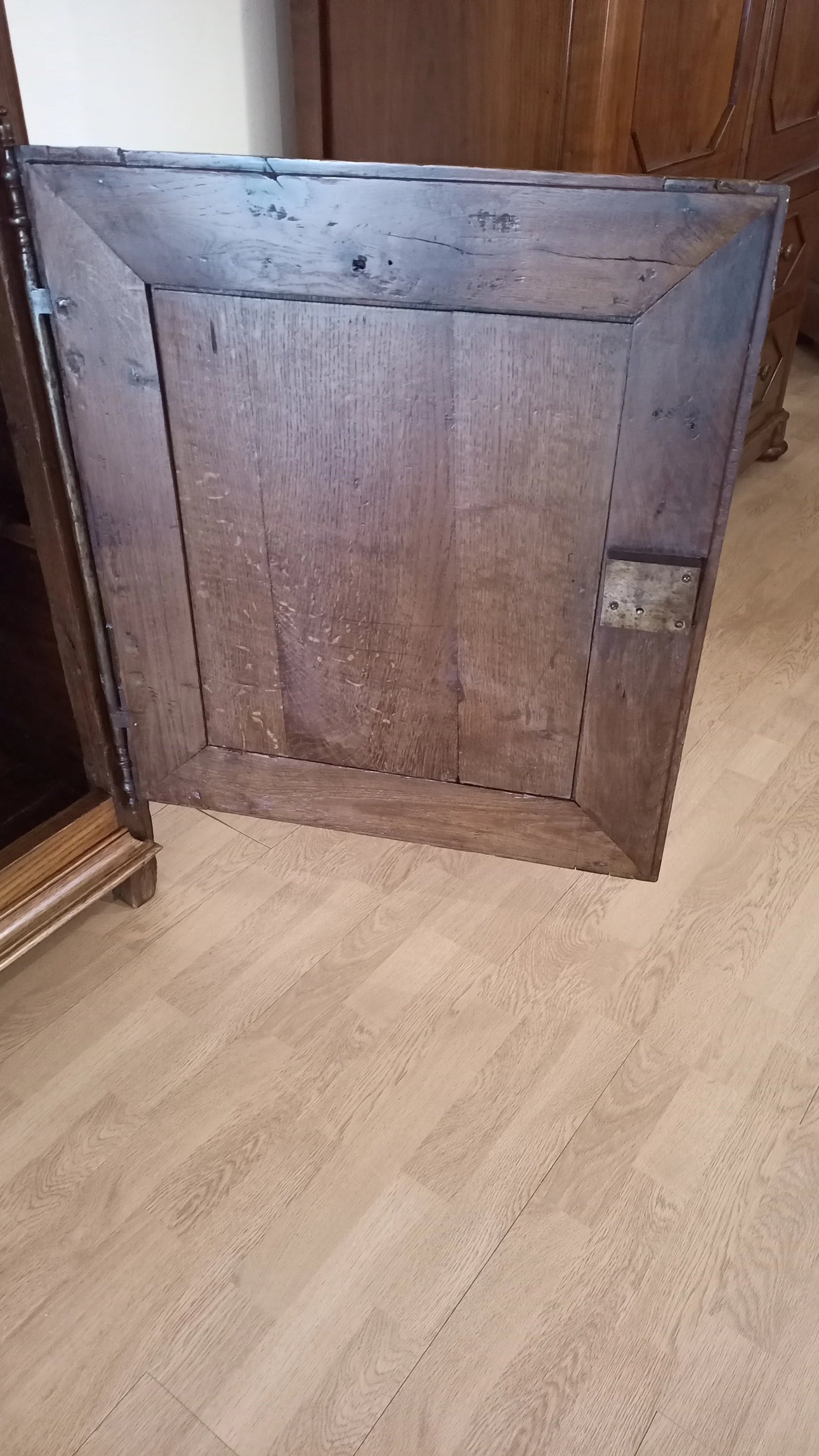 Dark cabinet door with simple rectangular frame in vintage rovere wood for credenza bassa 1700 rustic design