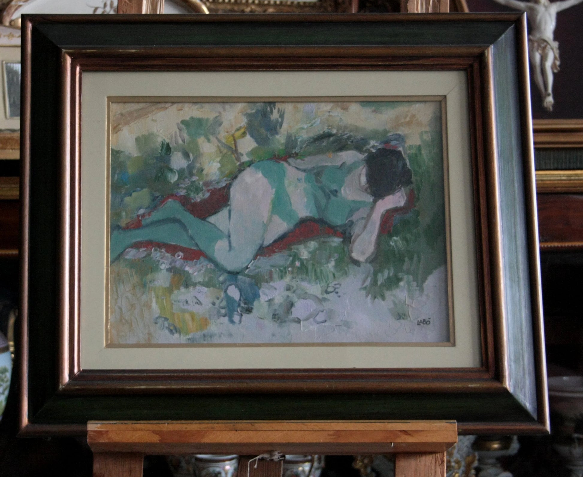Dipinto olio su tela raffigurante ragazza distesa con firma di savino labò in cornice elegante
