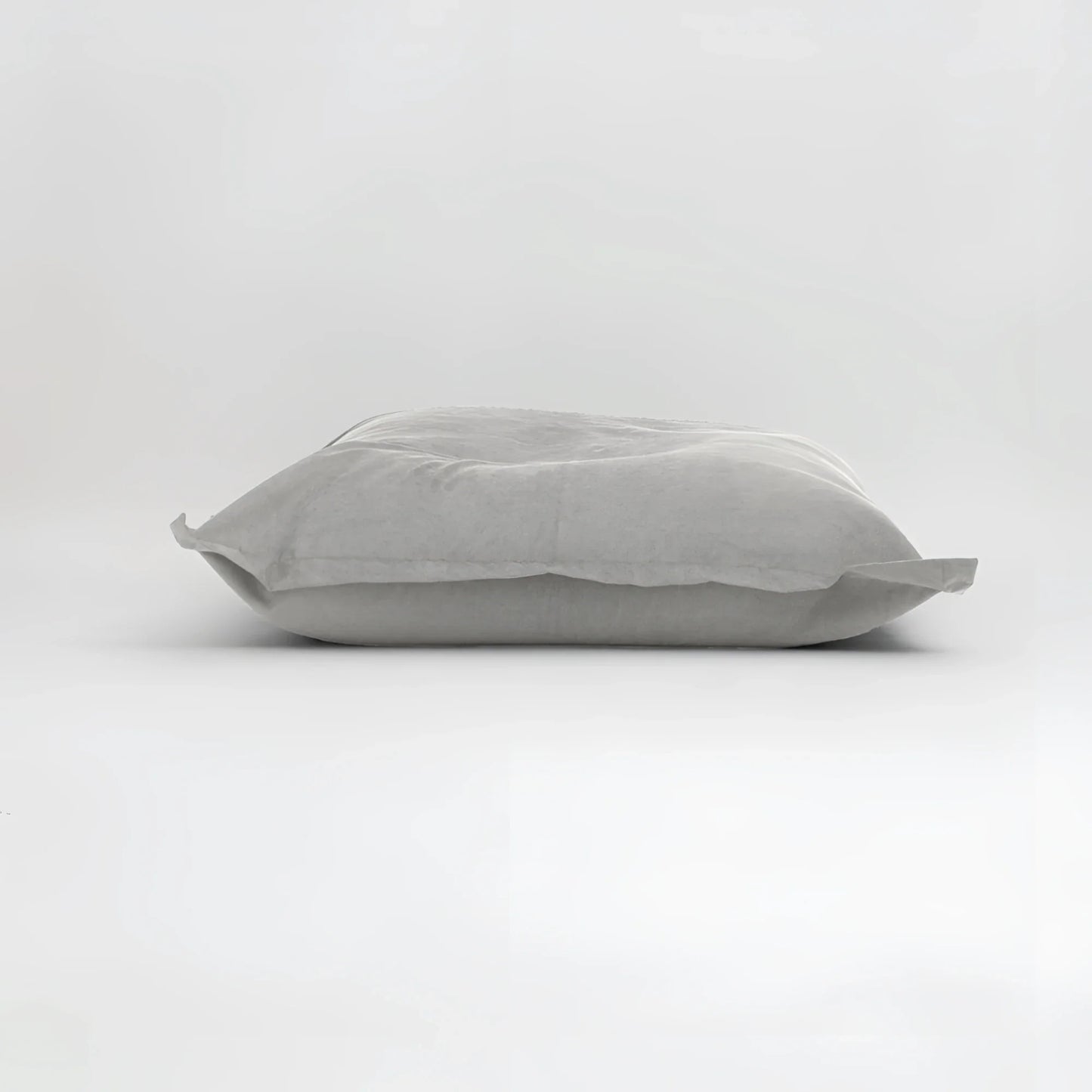 Maxi cuscino firenze in tessuto grigio chiaro con texture sottile e dimensioni generose per un infinito abbraccio