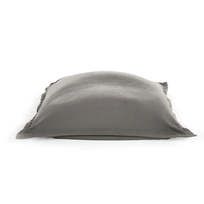 Maxi cuscino firenze in lino grigio morbido con superficie leggermente texture e bordi sfrangiati dimensioni generose infinito abbraccio