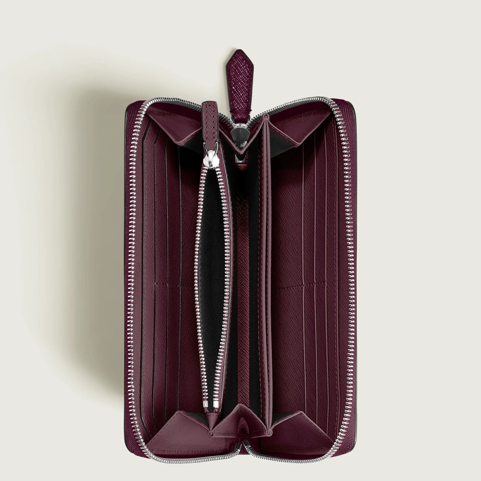 Portafoglio montblanc sartorial cassis in pelle bordeaux con zip argentate e superficie testurizzata modello sartorial cassis