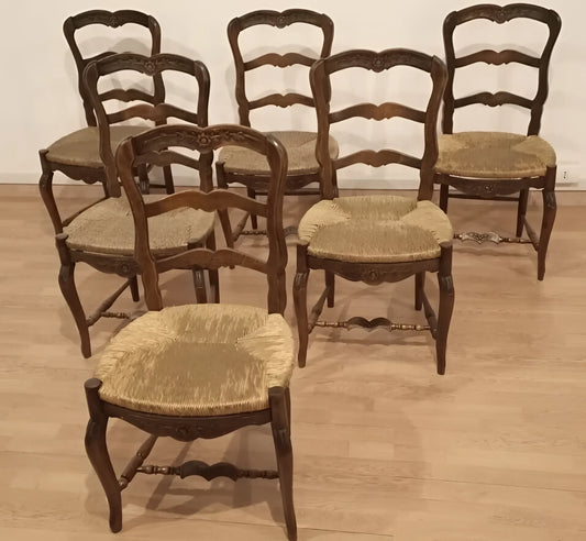 Set of five rustic Provencal chairs in solid oak from the 19th century with straw seats, restored in excellent condition.