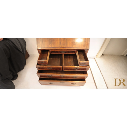 Wooden cabinet with open drawers showcasing compartments of splendido Trumeaux Luigi XVI